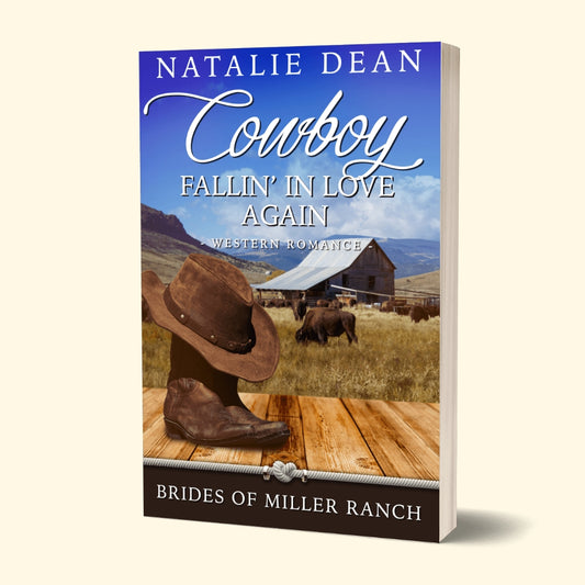 Paperback mockup cover of Cowboy Fallin' In Love Again, Brides of Miller Ranch, N.M. Book 6, western romance by Natalie Dean; boots with buffalo and a barn in the background